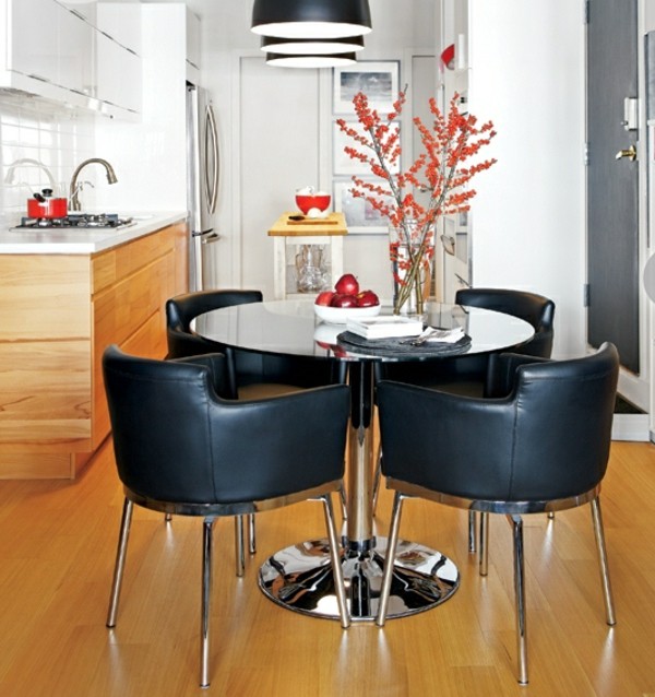 Leather chairs fitted kitchen set up small flat