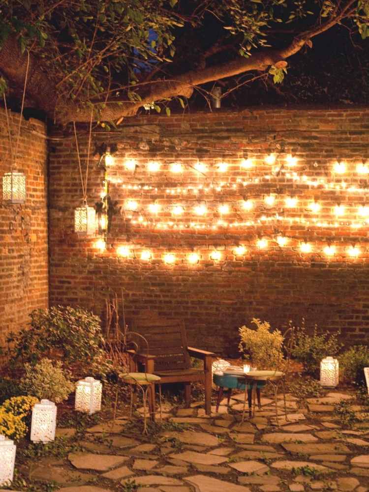 decorating ideas Garden party lights brick wall