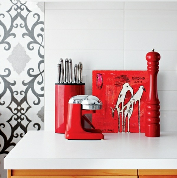 red cooking utensils make kitchen decorating