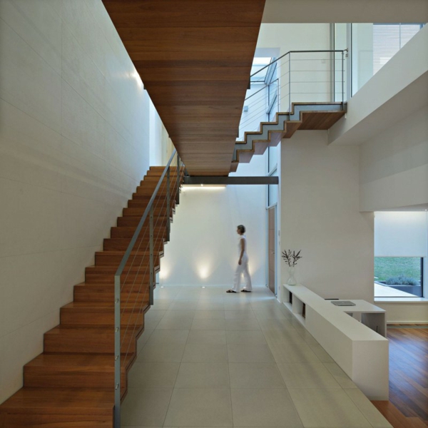  staircase railings glass floor tiles white walls 