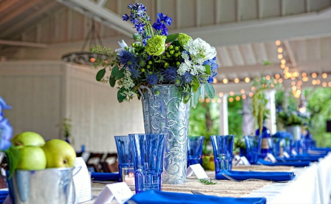 blue table setting napkins cups green color scheme