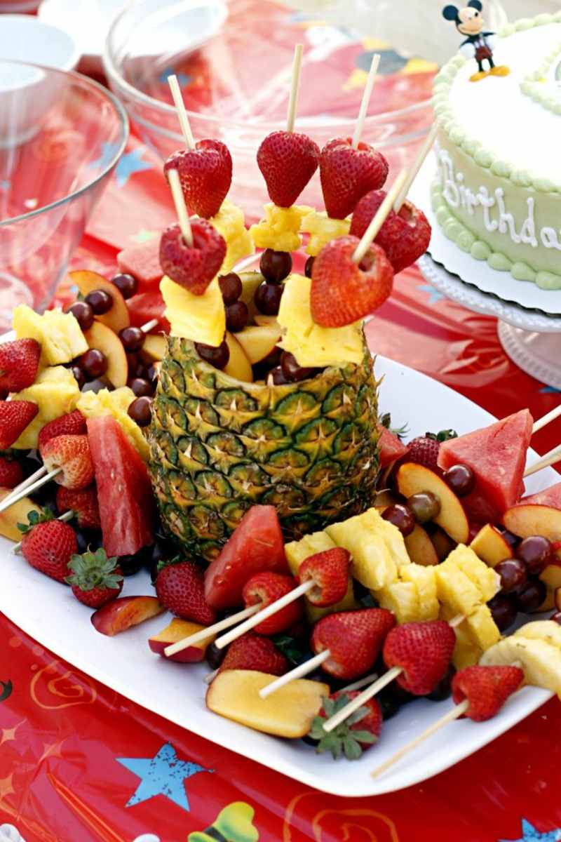 eating for kids birthday fruit skewer pineapple strawberries apples