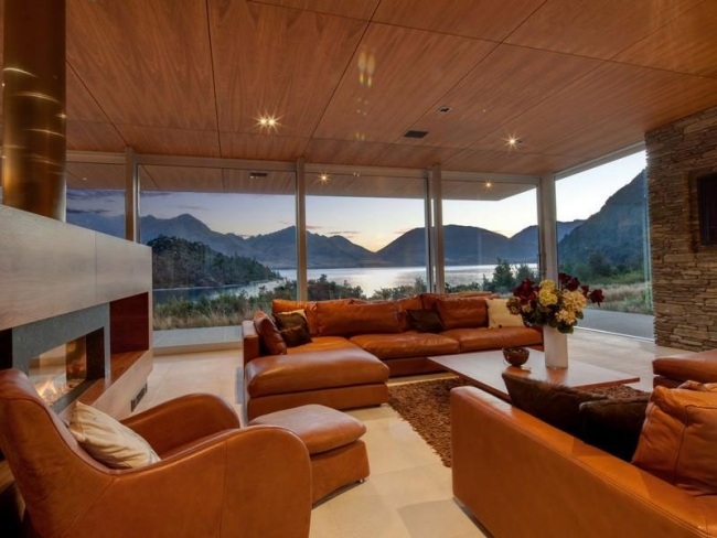 leather furniture comfortable house with lake in New Zealand