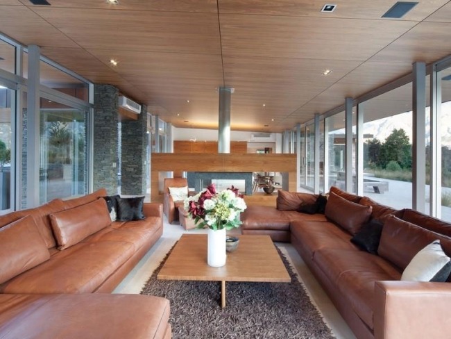 Leather sofa living room house with lake in New Zealand