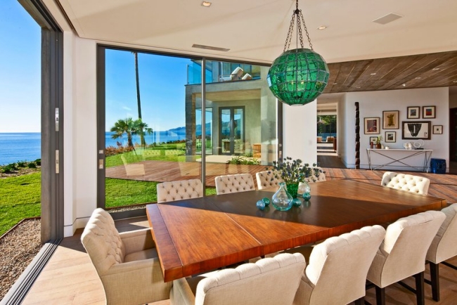  maritimes Dining Terrace floor to ceiling glass windows upholstered chairs 
