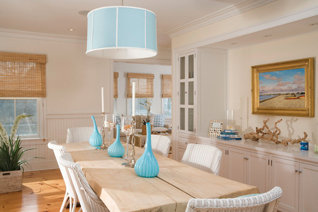 aqua-colored dining room turquoise vases bright wood rattan chairs