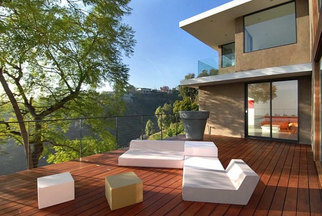 house terrace view white outdoor furniture geometric shapes