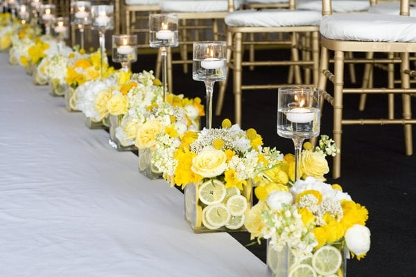 square glass vases lemons flowers floating candles