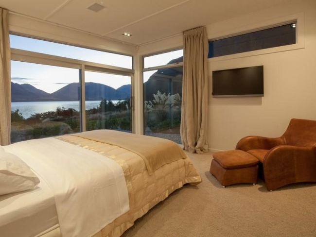 bedroom view house with lake in New Zealand