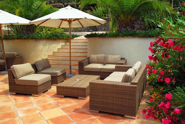 terrace rattan furniture set brown beige terracotta tiles