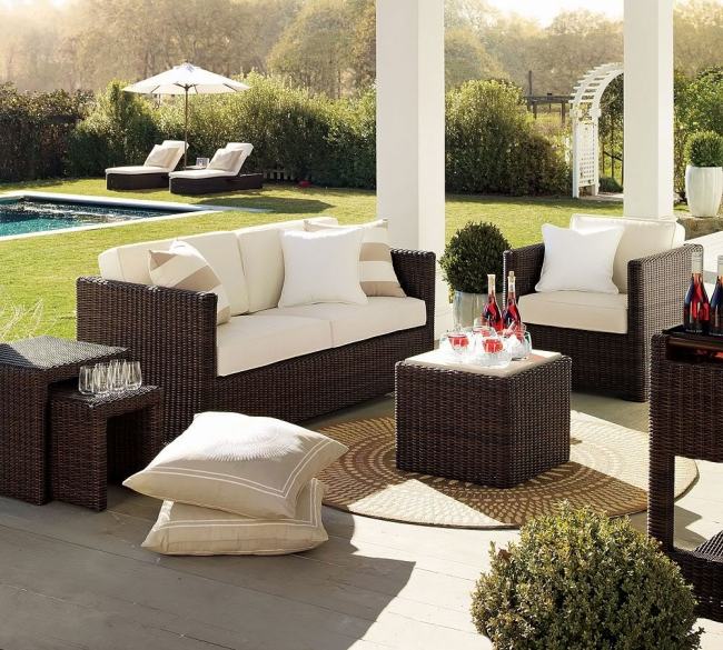 covered terrace pool wicker garden furniture round carpet