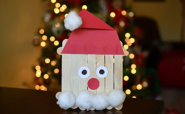 Basteln für Weihnachten weihnachtsmann-eisstäbchen-wattebällchen-papier-selber-machen