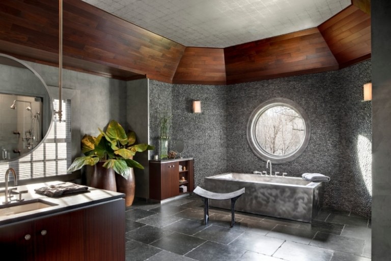 Badgestaltung-Badideen-moderne-Beton-Badewanne-Rundfenster-Granitfliesen