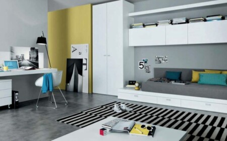 teenager zimmer interieur weiss grau streifen teppich tagesbett schreibtisch