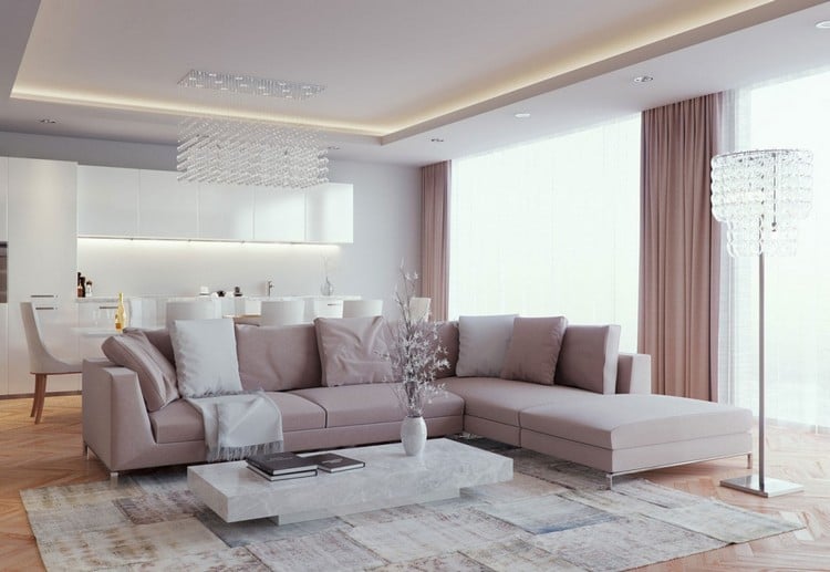 Wohnzimmerbeleuchtung-abgehangte-decke-rosa-ecksofa-marmor-couchtisch