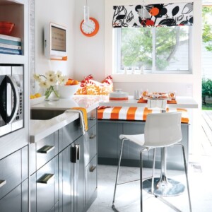 Orange-accessoire-stahlerne-akzente-küche