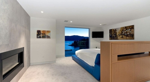 luxuriöse Villa schlafzimmer kamin weiß blau