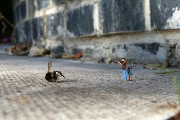 Fliege erschießen-Straßenkunst miniature design