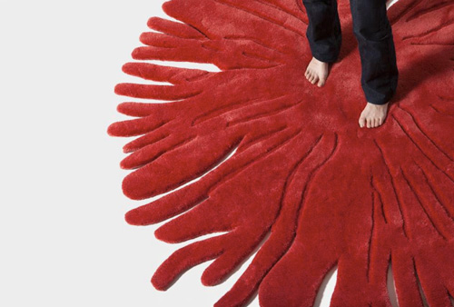 teppich designs moderne einrichtung pompon rot