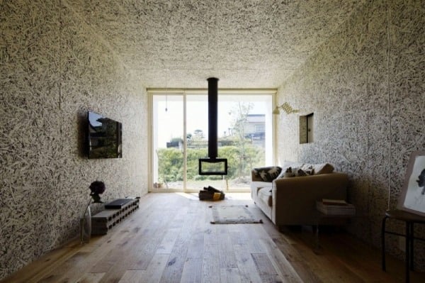 Wohnzimmer offener Wohnraum Kamin-Sofa Glasscheibe