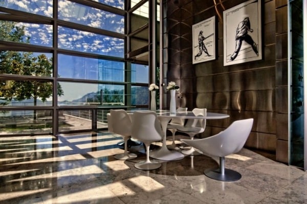 moderne luxushaus aus stein und glas essbereich