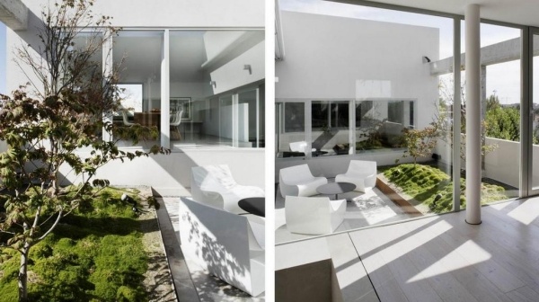 Sonnige Dachterrasse Bepflanzung moderne Sitzmöbel-weiß