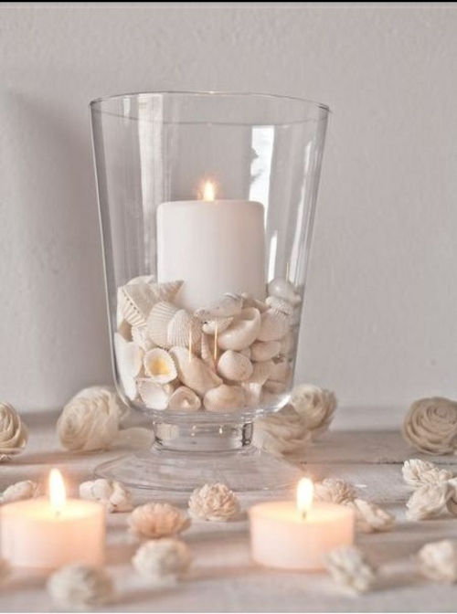 Verlobung Tischdeko Ideen-weiße Kerzen Muschel