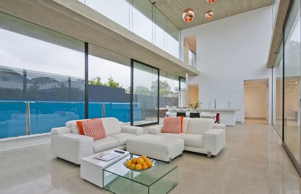 modernes haus aus glas und beton wohnzimmer