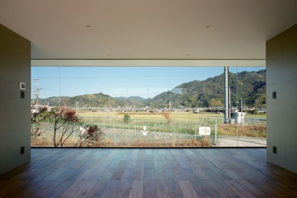 Wohnbereich Glasfassade Laminat verlegen Glasfront