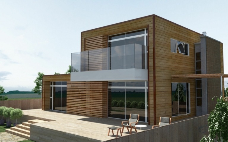 holzhaus bauen modern blockhaus glas gelaender balkon terrasse