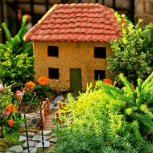 miniaturgärten in pflanzkübeln vorgarten idee haeuschen begruenung idee