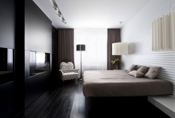 moderne Wohnung schlafzimmer schwarz matt kamin beige bett