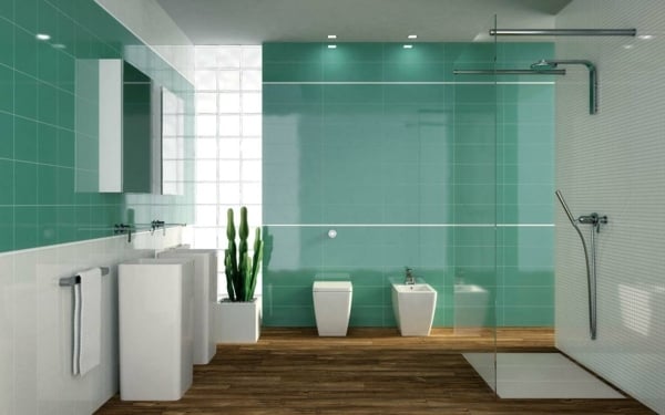 Badezimmer grün Fliesen Duschkabine Glas weiße Badmöbel