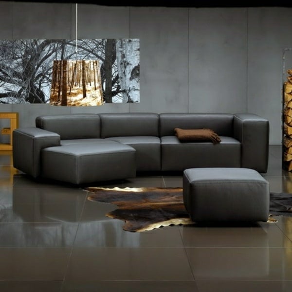 Wohnzimmer planen einrichten schwarzes Sofa modernes Interieur