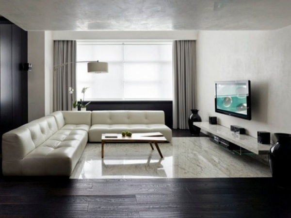 minimalistisches wohnzimmer gestepptes ecksofa schwraz weiß