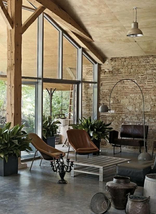 rustikales Wohnzimmer Boden Decke Fenster Leder Sessel