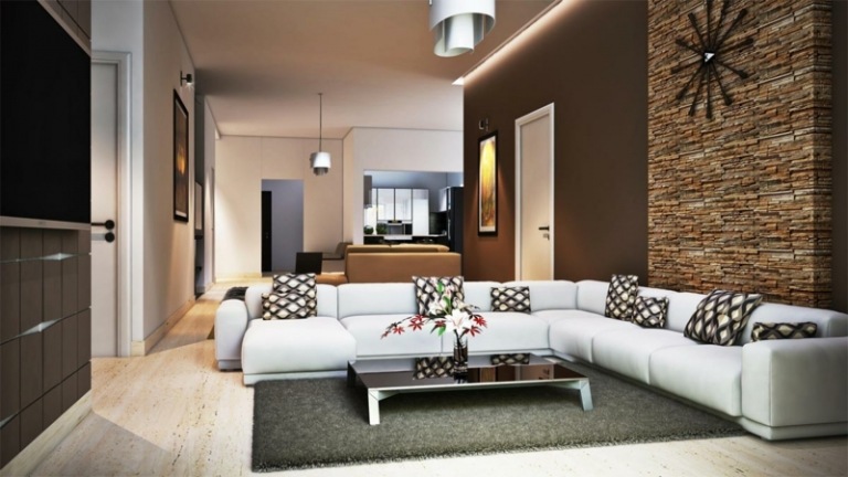 wandgestaltung im wohnzimmer akzentwand stein braun wandfarbe weiss sofa