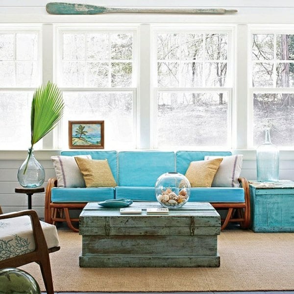 Einrichtung blauer Bambus Sofa vintage Holztisch Deko