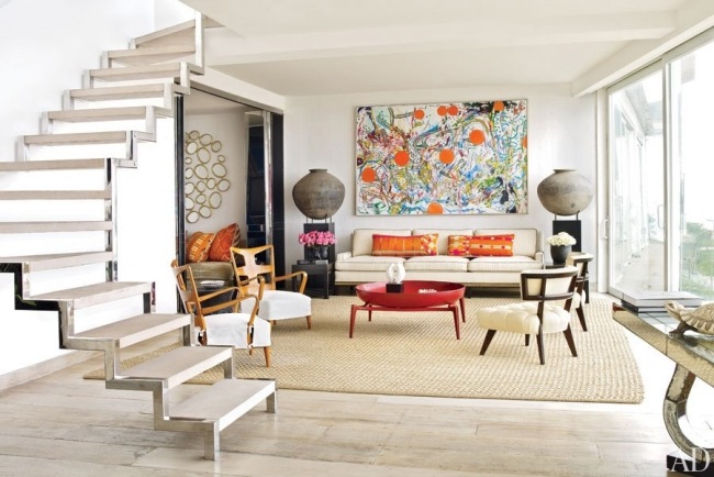 designer wohnzimmer neutrale farben kulisse farbenfrohe akzente