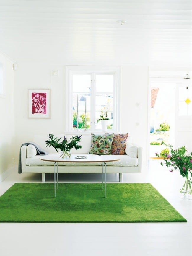 farben im wohnzimmer grün weiß teppich blumen