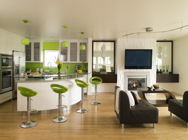 wohnzimmer und küche in einem optisch getrennt grasgrün braun