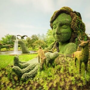 Frau mit Hirschen-Skulptur Blumen-Montreal kanada-Wettbewerb Gartenkunst