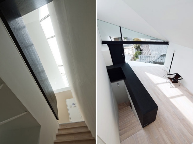 minimalistisches wohnhaus dachfenster glaswände