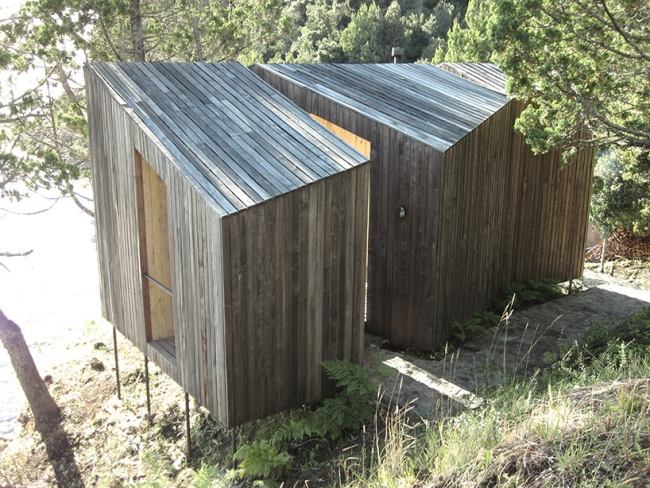 oberblick hinterseite holz sauna design mit seeblick