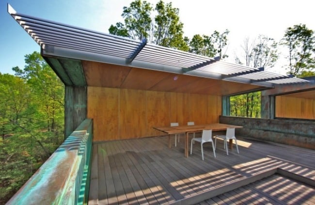 Dachterrasse Überdachung-Schräge energie sparhaus-im Wald