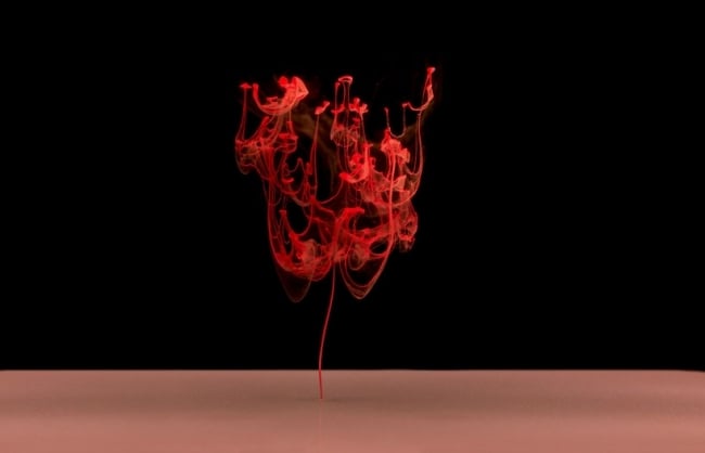 Explosion Rote-Tinte in Wasser-hi speed Kamera-Fotos aufnehmen