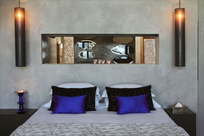 Exquisites Schlafzimmer-Blaue Kissen-Anzent Wandbeleuchtung-Hotel Design