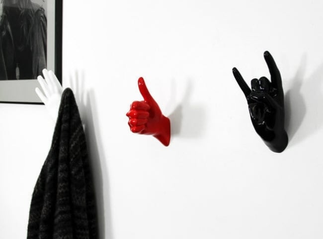 Möbel im Korridor-Kleiderhacken Design-Hand rot schwarz Geste