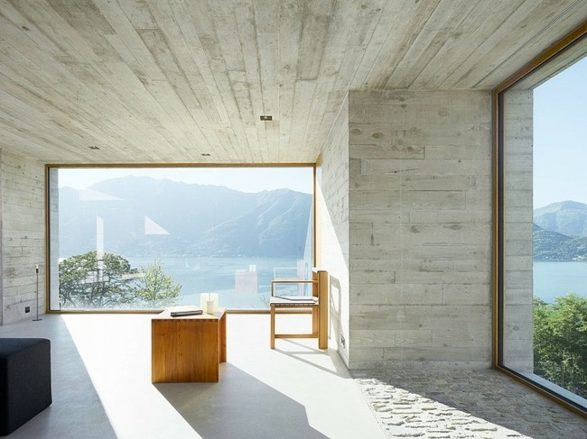 Betonhaus stilvolles Design See Gebirge Schweiz