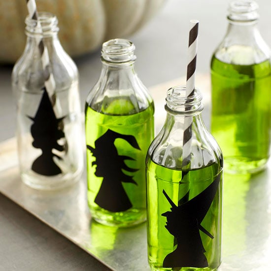 getränkeflaschen halloween party papier hexensilhouetten grün